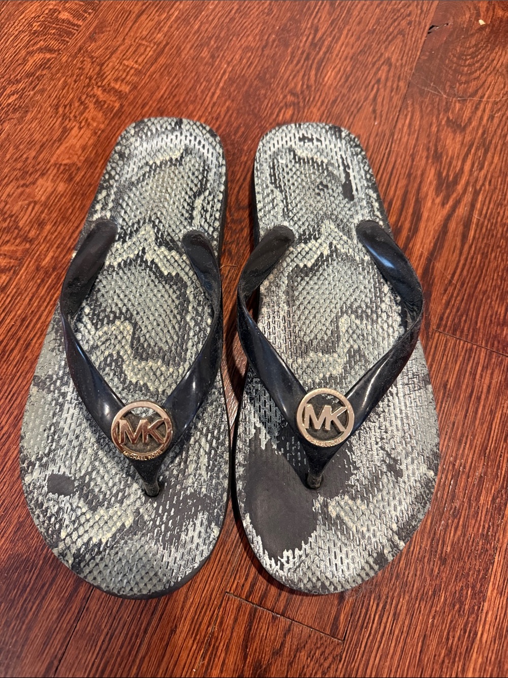 Michael Kors Black Flip Flops with Gold MK Emblem